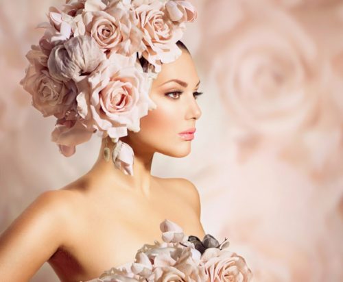 Beautiful woman with rose headpiece